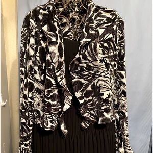 Two piece dress and jacket set. Both are pleated